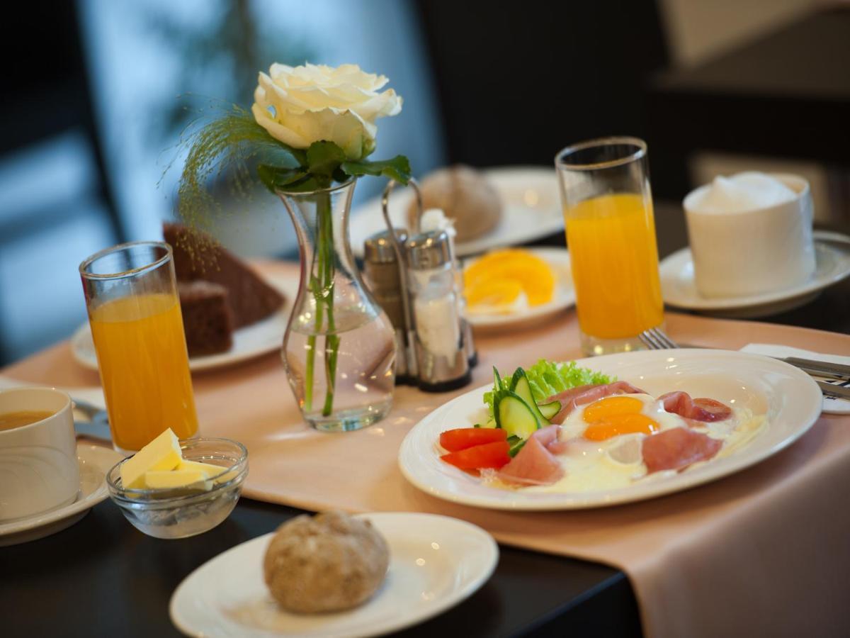 Ea Business Hotel ยีห์ลาวา ภายนอก รูปภาพ