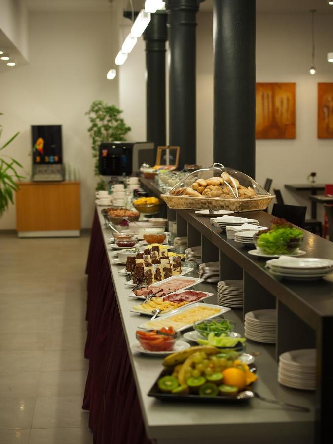 Ea Business Hotel ยีห์ลาวา ภายนอก รูปภาพ